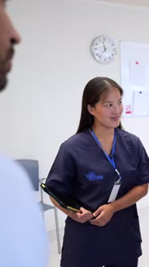 Hospital Staff Engaging in Team Discussion and Collaboration
