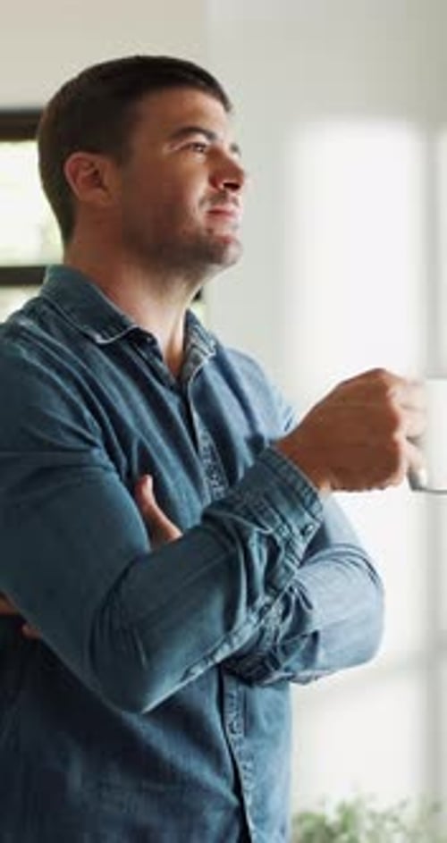 Man, relax and thinking in house with coffee, calm morning routine and contemplation for weekend