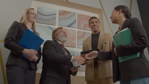 Professional Business People Meeting with Foreign Partners at Office