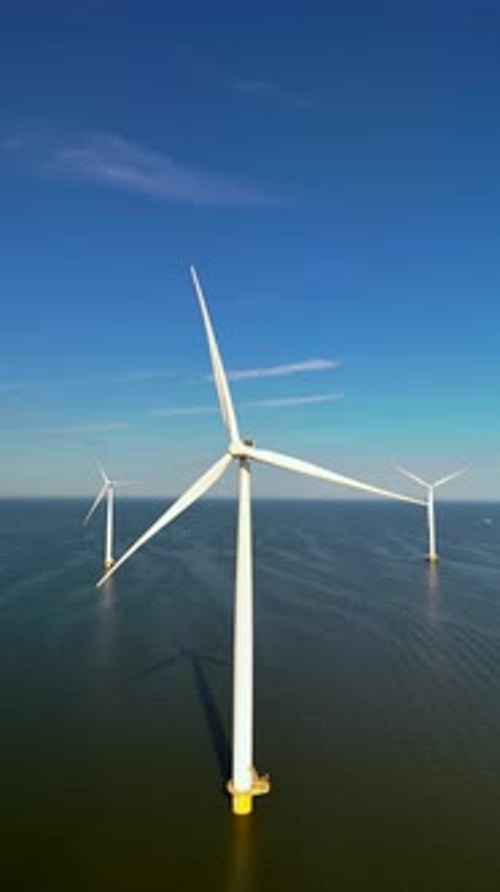 Una vista aérea muestra las turbinas eólicas de los Países Bajos que aprovechan la energía renovable para la sostenibilidad