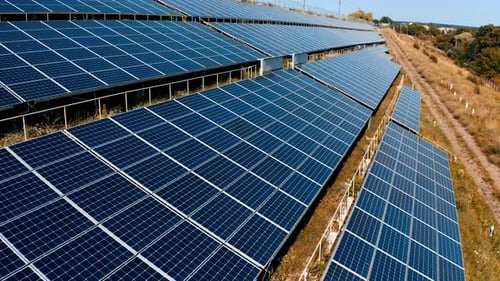 Aerial View of Solar Panels Generating Green Energy