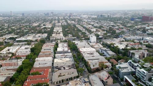Aerial view of the West Hollywood cityscape, downtown Los Angeles in the background, in California,