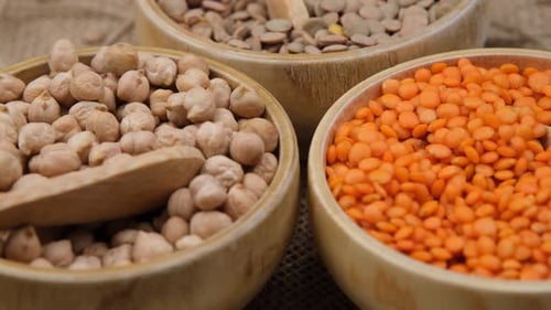 Close Up of Chickpeas and Lentils in Bowls