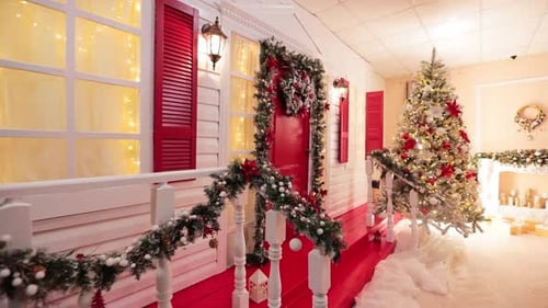 Christmas Themed Facade with Decorations and Tree