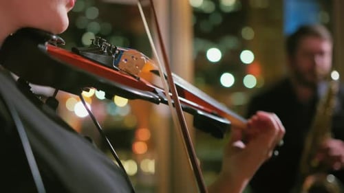 Close Up Shot of Woman Hand Playing Violin Musicians Instruments on Event