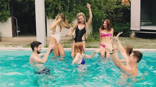Enjoy a Thrilling Summer Pool Party with Friends Soaking Under the Bright Sun and Diving Into the