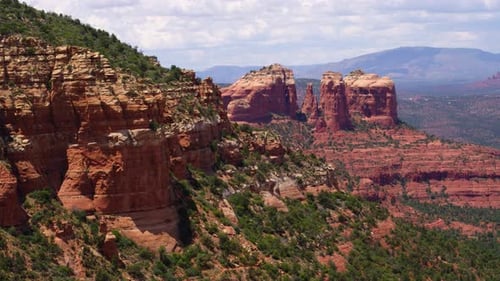 Red and green sedona cliffs beauty in Arizona high desert aerial drone view