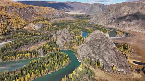 Meandering river in a scenic autumn mountain valley