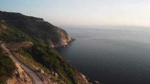 Aerial View of Island Cliffside Landscapeocean and Rocky Coast on Summer Day