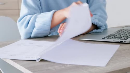 Laptop, paperwork and typing businesswoman in administration or human resources with invoice