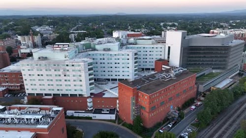Aerial orbit shot of UVA Health University Hospital in Charlottesville City. Early morning in americ