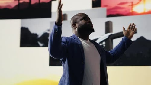 Black Spiritual Adult Meditating on Faith and Serenity in a Pose of Worship