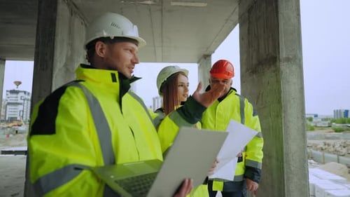 Civil Engineers are Viewing Construction Site Two Men and Young Woman are Discussing Building Plan