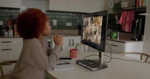 Woman Attending Video Call in Modern Kitchen