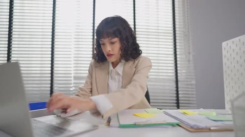 Asian young beautiful businesswoman working in the office workplace.