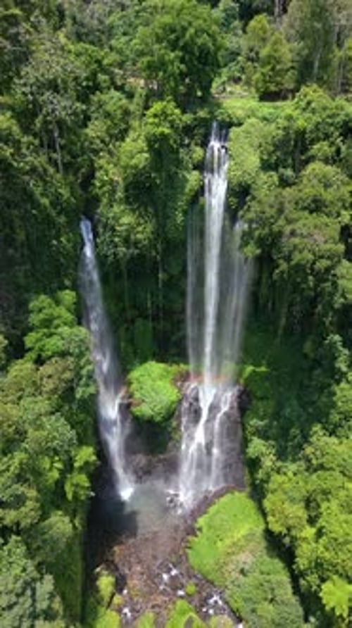 Aerial View Of Majestic Sekumpul Waterfall In Lush Rainforest In Bali Indonesia