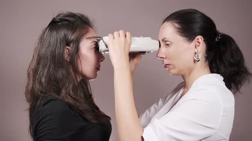 Eye Exam Using Ophthalmic Instrument