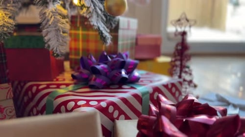 Gifts Under a Snowy Christmas Tree