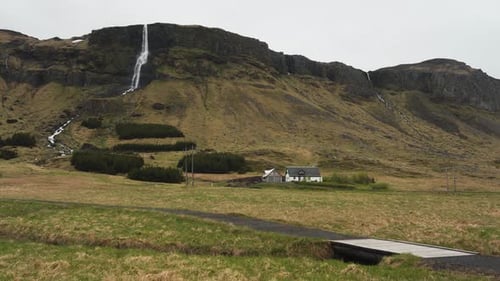 Panning view of the amazing waterfall Bjarnarfoss in Iceland. Recorded from ground level also showin