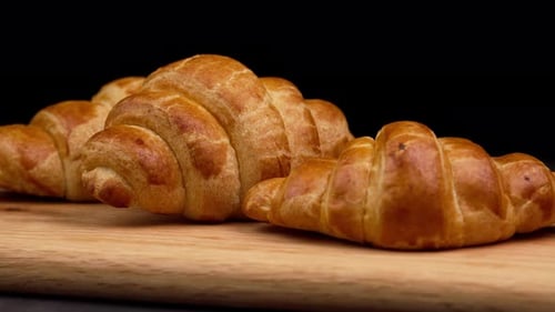 Homemade Croissants On A Wooden Table