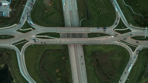 Drone Wide Shot Famous Road Intersection with Traffic on Multiple Flyovers in the Evening