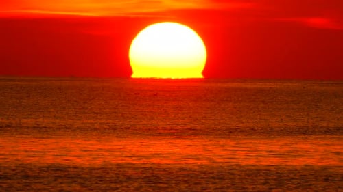 Sunset Ocean Sun Large Vibrant Red Sun Setting Over the Calm Sea Beautiful Majestic Natural Twilight