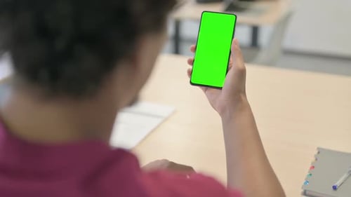 African Man Using Smartphone with Green Screen