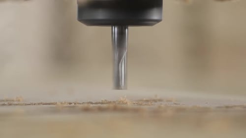 Milling Machine Cutting Wood Creating Shavings