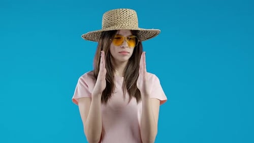 Enthusiastic Young Woman Shapes a Square