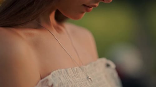 Young Woman's Face in Golden Hour Light