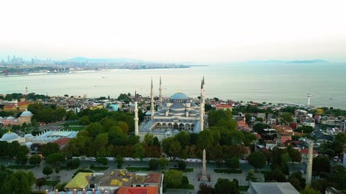 Cinematic Orbiting Aerial Drone View of The Blue Mosque in at Golden Hour in Istanbul, Turkey.