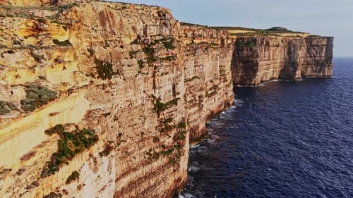 Aerial view of stunning Maltese cliffs and clear Mediterranean Sea