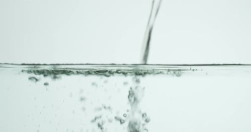 Fresh Water Pouring into more Water