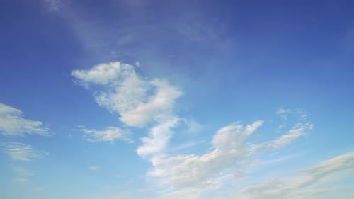 Cumulus Clouds Moves in the Blue Sky The Background of Light and Heavy Calm Clouds Changes Shape in