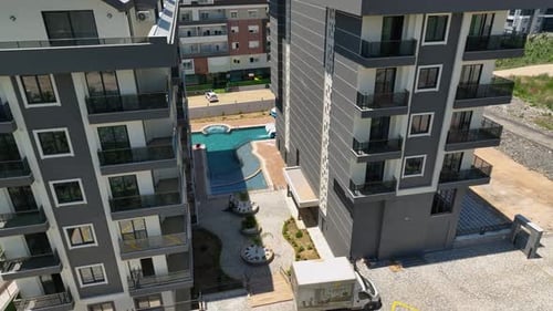 Aerial View Navigating Progress Homes Rise on the Path of Development