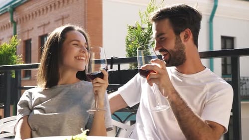 Woman and her handsome boyfriend in cafe