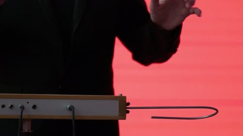 Person Playing Theremin Electronic Instrument Close Up