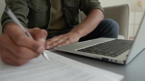 Close Up View Unrecognizable Man Male Guy Working Laptop From Home Browsing Internet Cropped Shot