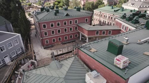 Construction Site with Builders Team Repairing of Building