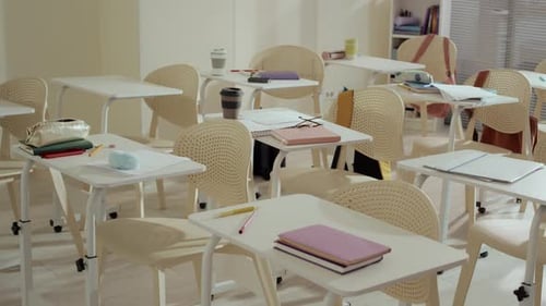 Fair Interior of School Classroom with Personal Belongings of Students