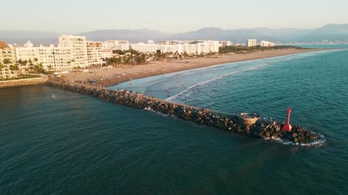 Small Stone Pier Standing Out On The Beach In Nuevo Vallarta, Nayarit, Mexico