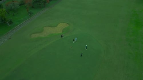 Golf Course Top View with Players Aerial View of Golfers on Green Golf Field