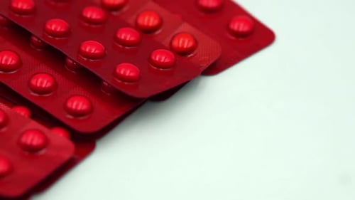 Close Up of Blister Packs with Red Pills