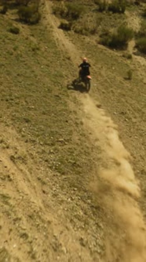 Motorbiker Maneuvers on Sloppy Hill Fpv