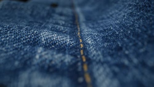 Denim Fabric Macro with Seam and Button