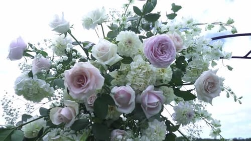 Light Color Flowers Arranged On A Wedding Event. Close-up Shot