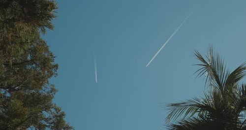 Contrail In Blue Sky