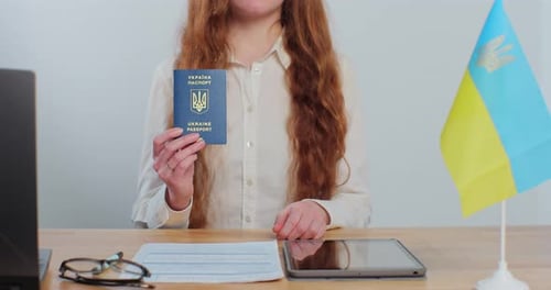 Ukranian Embassy Officer Showing Ukrainian Passport Immigrant Student Visa Approval Work Visa