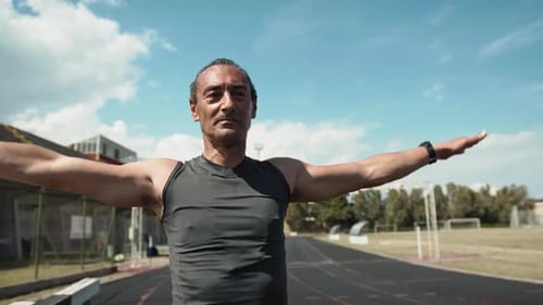 Adult Man Warming Up Before Running