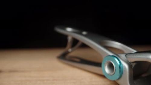 Close Up of Nail Clippers and Clippings